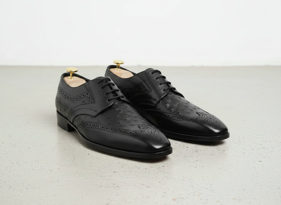 Handcrafted Men's Black Ostrich Leather Wingtip Shoes