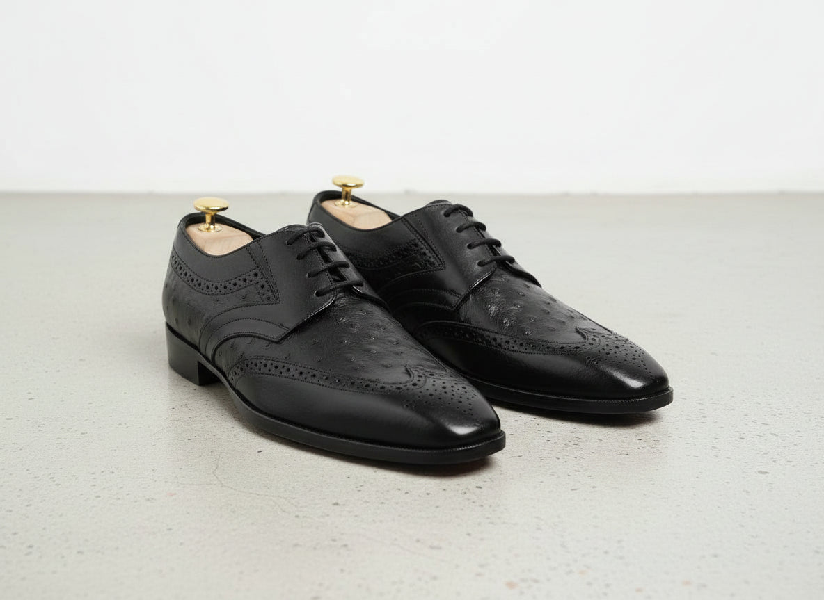Handcrafted Men's Black Ostrich Leather Wingtip Shoes