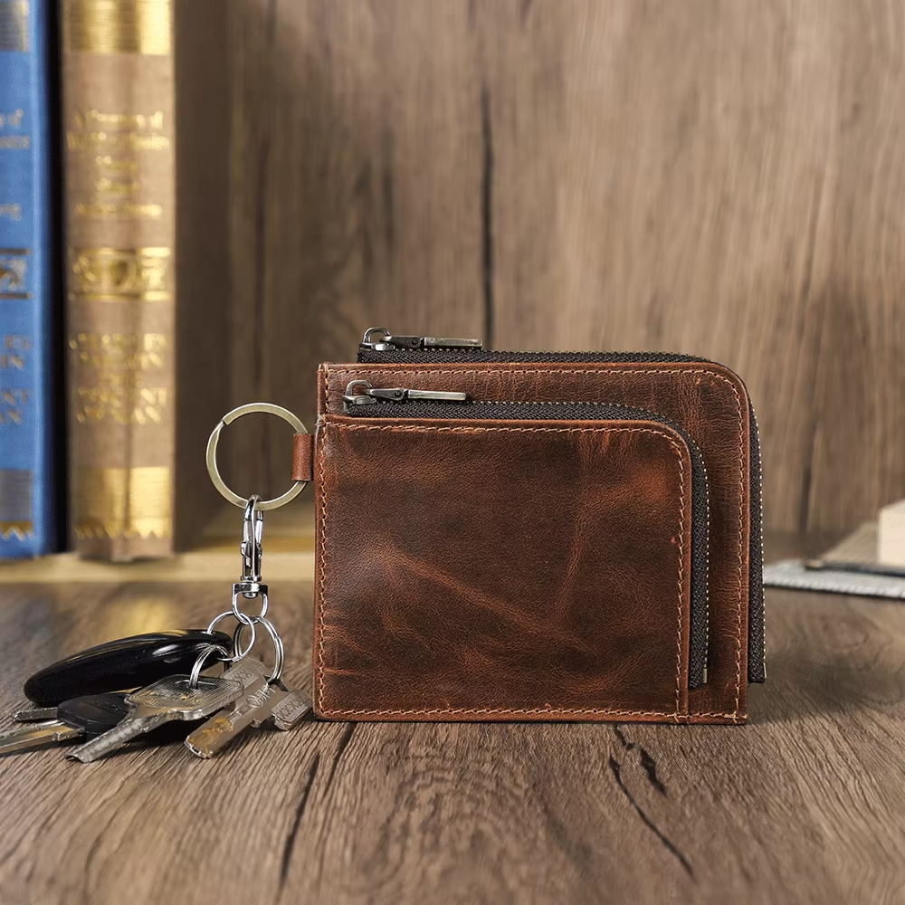 Brown leather zip wallet with a key ring