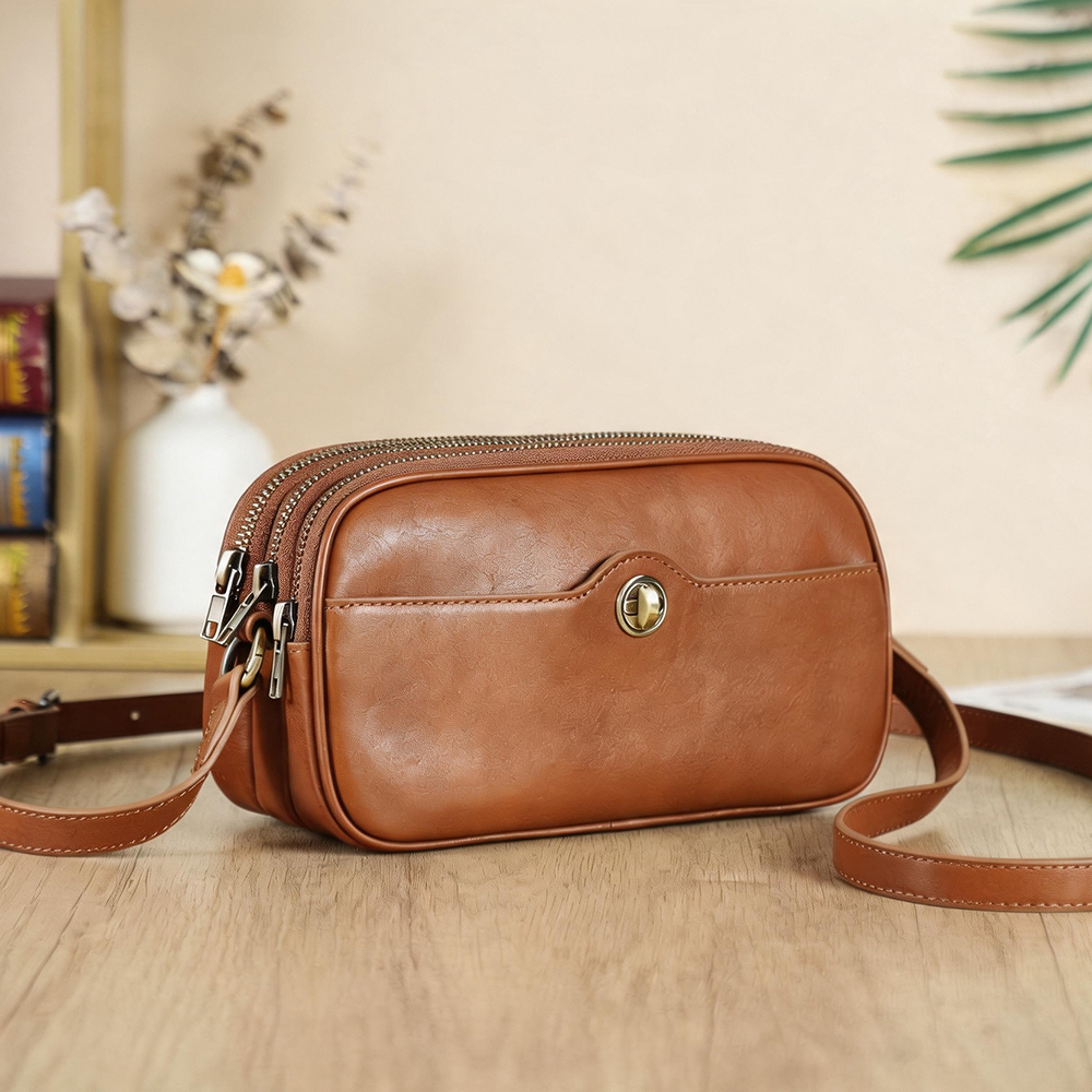 Women's Cognac Twist-Lock Silver Hardware Leather Crossbody Bag