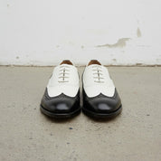 Handcrafted Men's Black and White Wingtip Dress Shoes