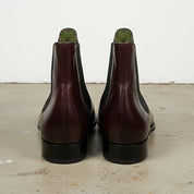 Men's Burgundy and Black Plain-Toe Leather Chelsea Boots — Clawton