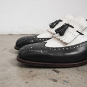 Men's Black and White Wingtip Leather Tassel Loafers — Rowe
