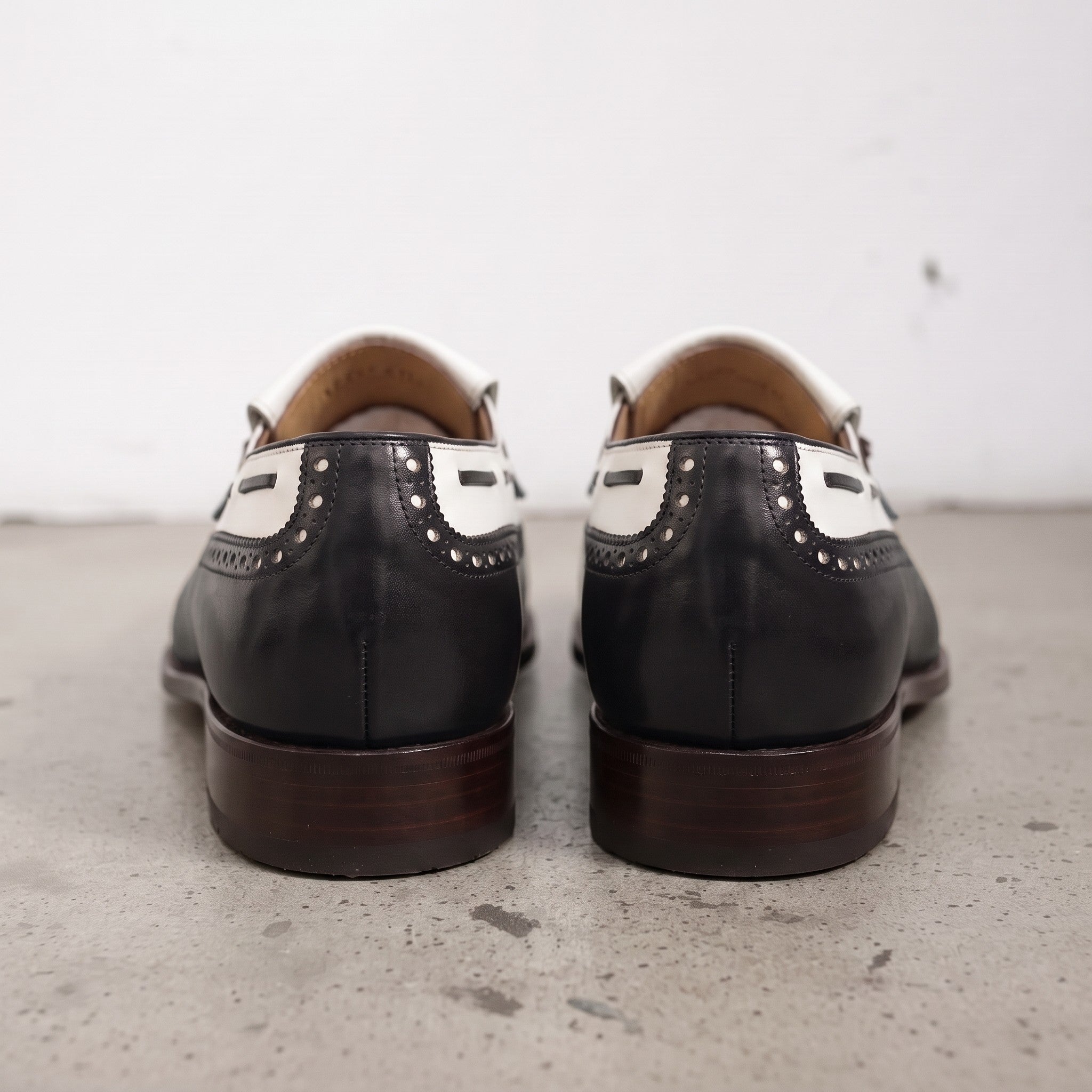 Men's Black and White Wingtip Leather Tassel Loafers — Rowe