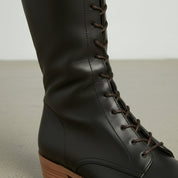 Handcrafted Black Leather Knee-High Boots for Women with Lace-Up Detail