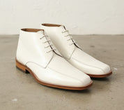 Handmade Men White leather Chukka Boots, Men Square Toe lace up dress boots - angle-view-showing-depth