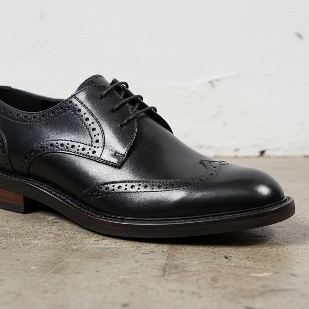 Handmade Men's Black & Brown Leather Wingtip Dress Shoes - detail-view-showing-texture