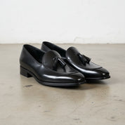 Handmade Mens black leather tsseled moccasins, Mens dress leather shoes - angle-view-showing-depth