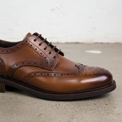 Handmade Men's Black Leather Wingtip Oxfords - detail-view-showing-texture