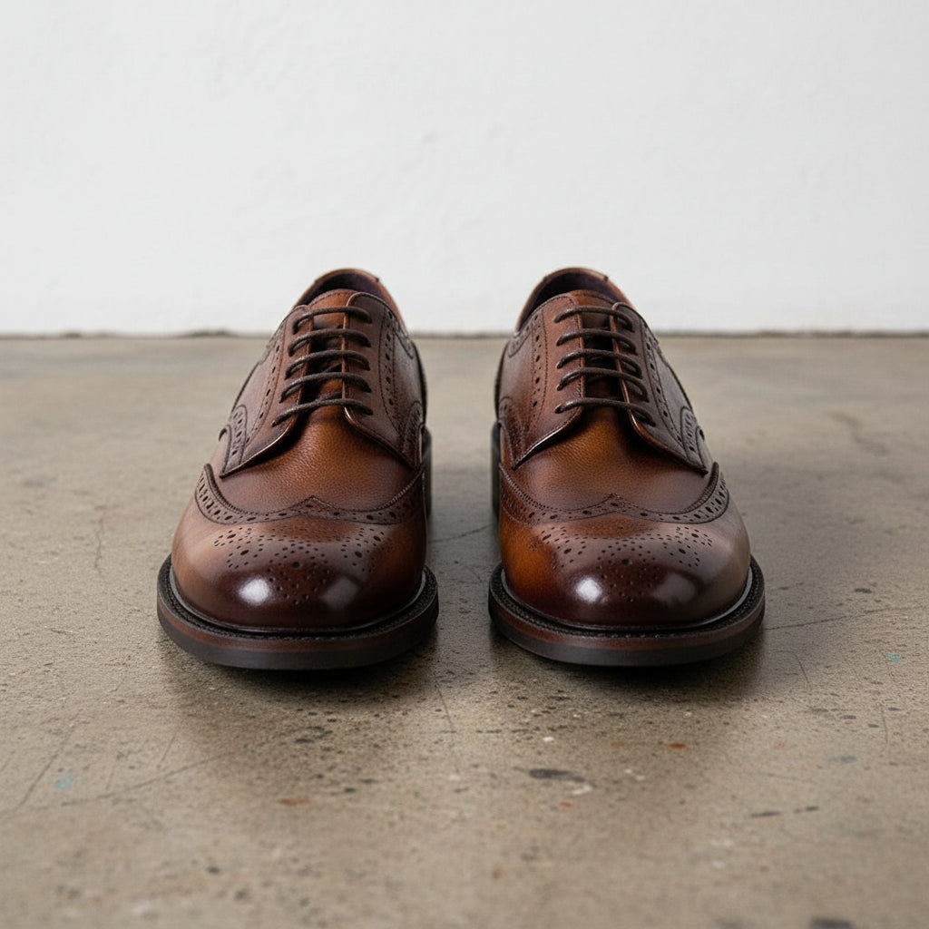 Handmade Men's Black Leather Wingtip Oxfords - front-view