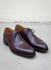 Handmade Mens dark maroon lace up dress shoes, Men leather oxford shoes - angle-view-showing-depth