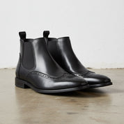 Handmade Men's Full Grain Leather Wingtip Chelsea Boots - angle-view-showing-depth