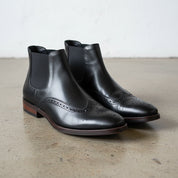 Handmade Men's Full Grain Leather Wingtip Chelsea Boots - angle-view-showing-depth