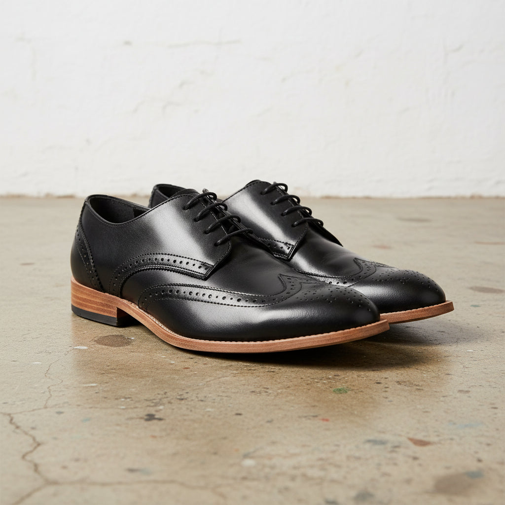 Handmade Men's Full Grain Leather Wingtip Dress Shoes - angle-view-showing-depth