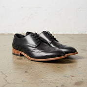 Handmade Men's Full Grain Leather Wingtip Dress Shoes - angle-view-showing-depth