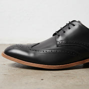 Handmade Men's Full Grain Leather Wingtip Dress Shoes - detail-view-showing-texture