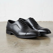 Handmade Men's Leather Cap-Toe Derby Shoes - angle-view-showing-depth