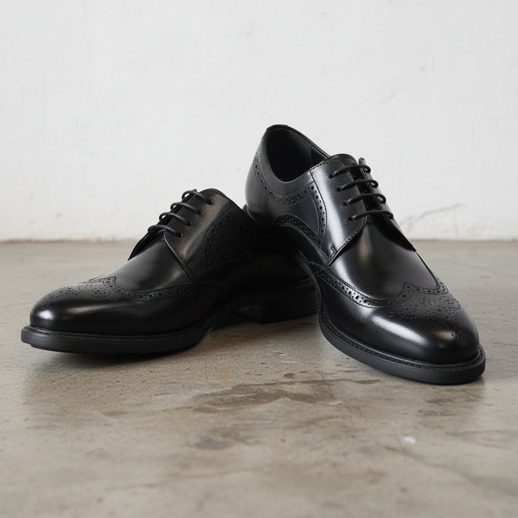 Handmade Men's Leather Wingtip Oxfords Dress Shoes - angle-view-showing-depth