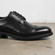 Handmade Men's Leather Wingtip Oxfords Dress Shoes - detail-view-showing-texture