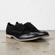 Handmade Men's Leather Wingtip Oxfords Shoes - angle-view-showing-depth