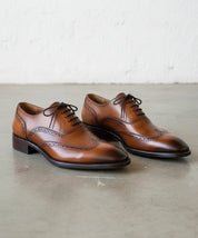 Handmade Mens Tan brown wingtip Leather Dress shoes, Men brogue formal shoe - angle-view-showing-depth