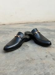 Men Handmade Black Leather Mule Slippers, Flat Horsebit Leather Slippers - angle-view-showing-depth
