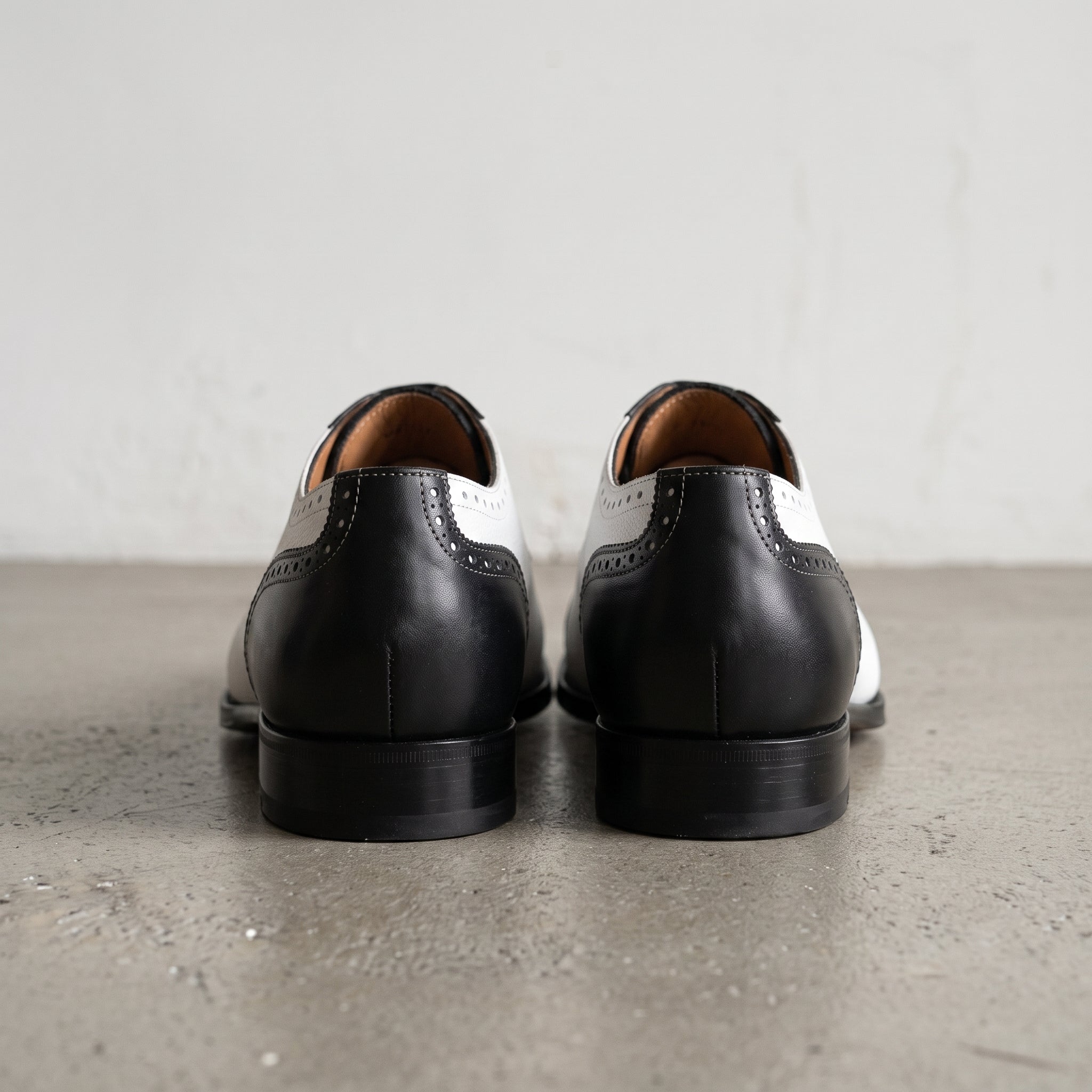 Men's Black and White Cap-Toe Pebbled Leather Spectator Oxfords — Brinton