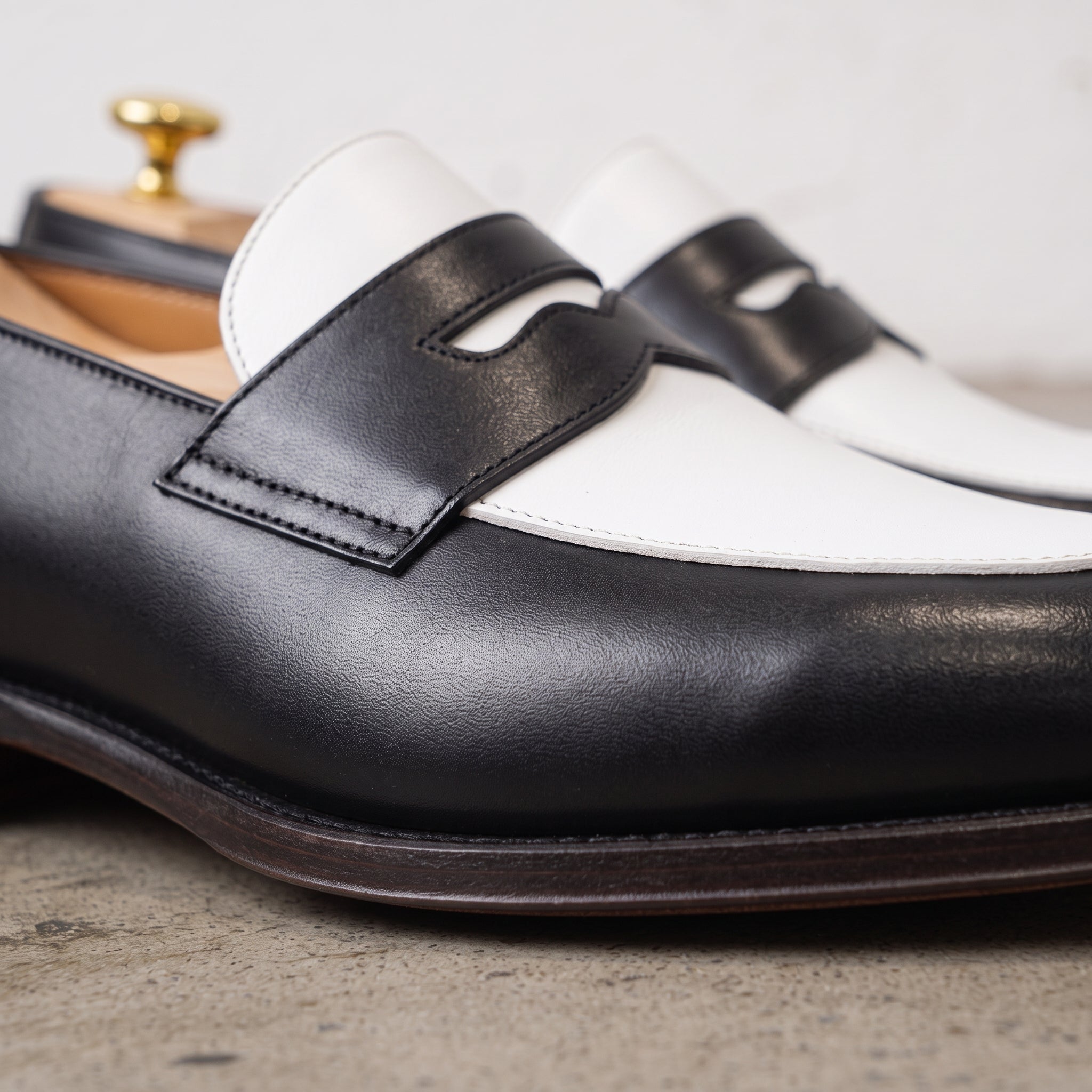 Men's Black and White Plain-Toe Leather Spectator Penny Loafers — Connell