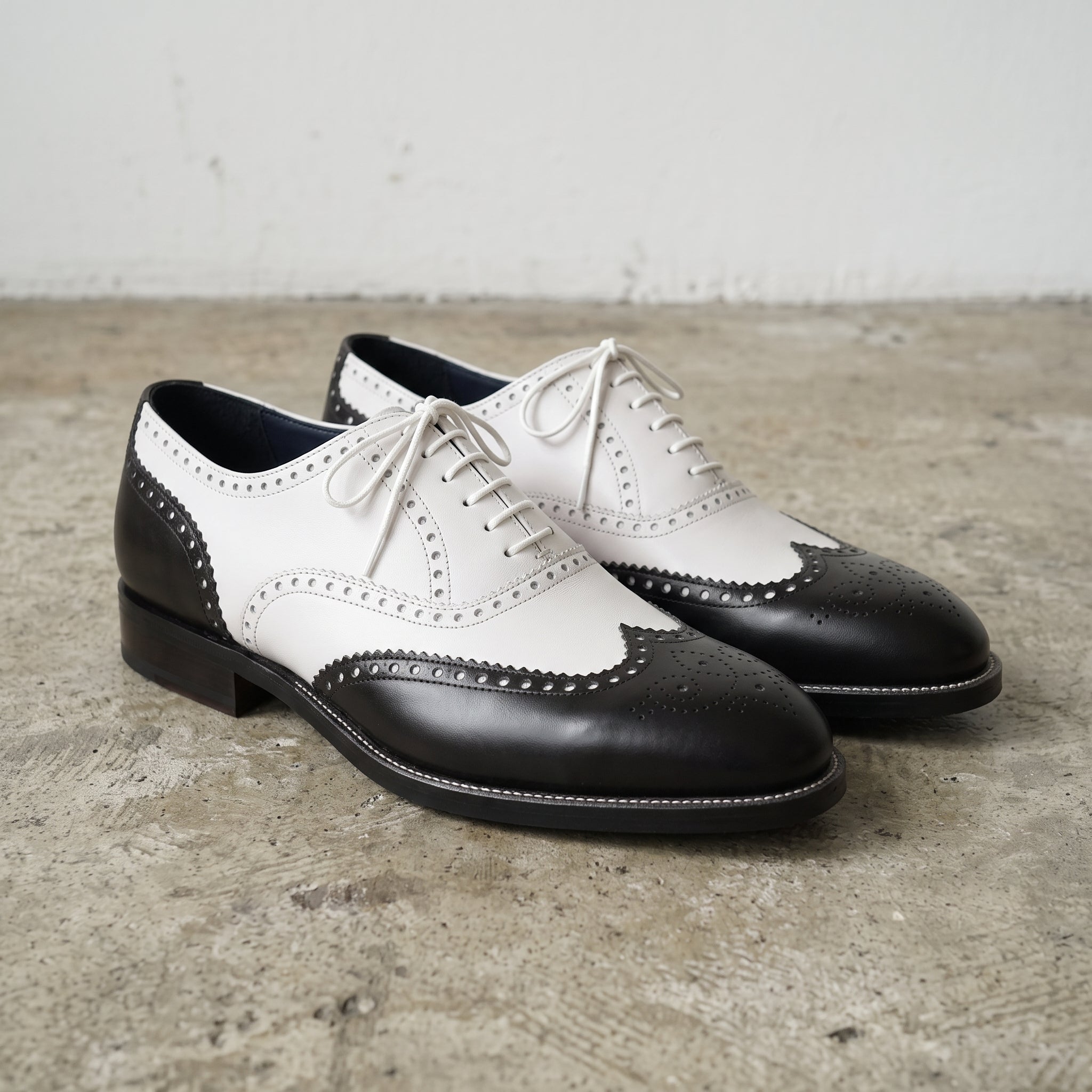 Men's Black and White Two-Tone Wingtip Leather Oxfords — Gunnell