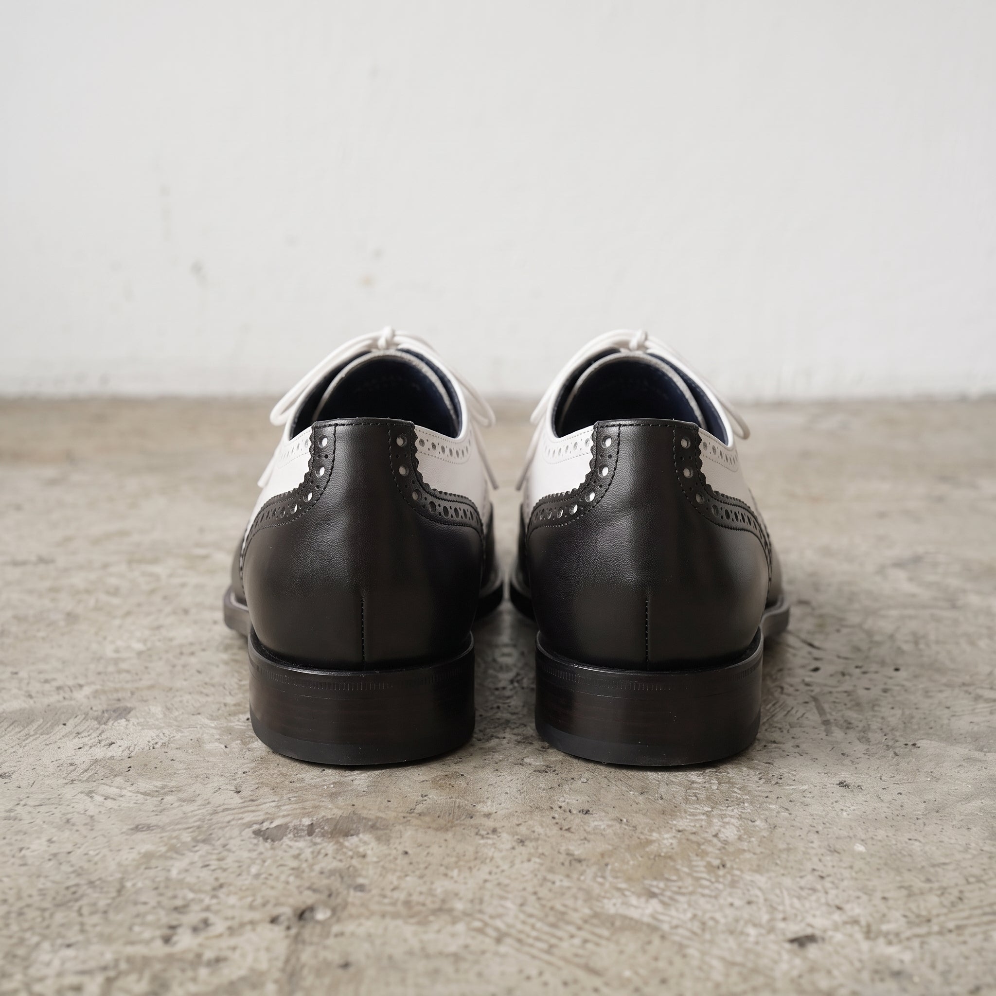 Men's Black and White Two-Tone Wingtip Leather Oxfords — Gunnell