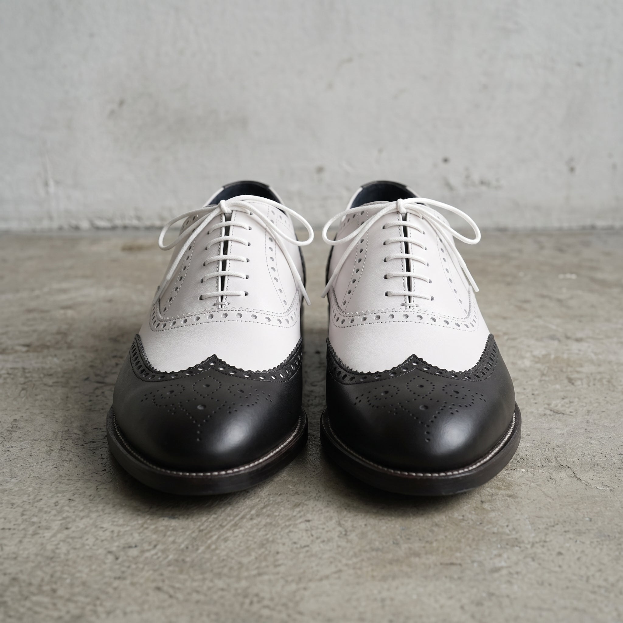 Men's Black and White Two-Tone Wingtip Leather Oxfords — Gunnell