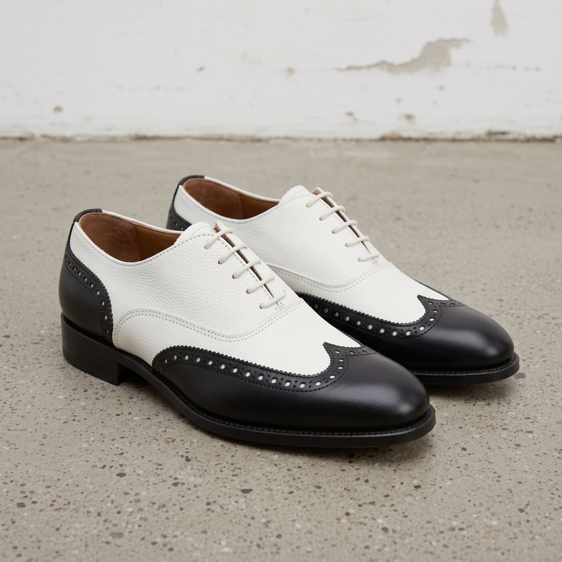 Handcrafted Men's Black and White Wingtip Dress Shoes