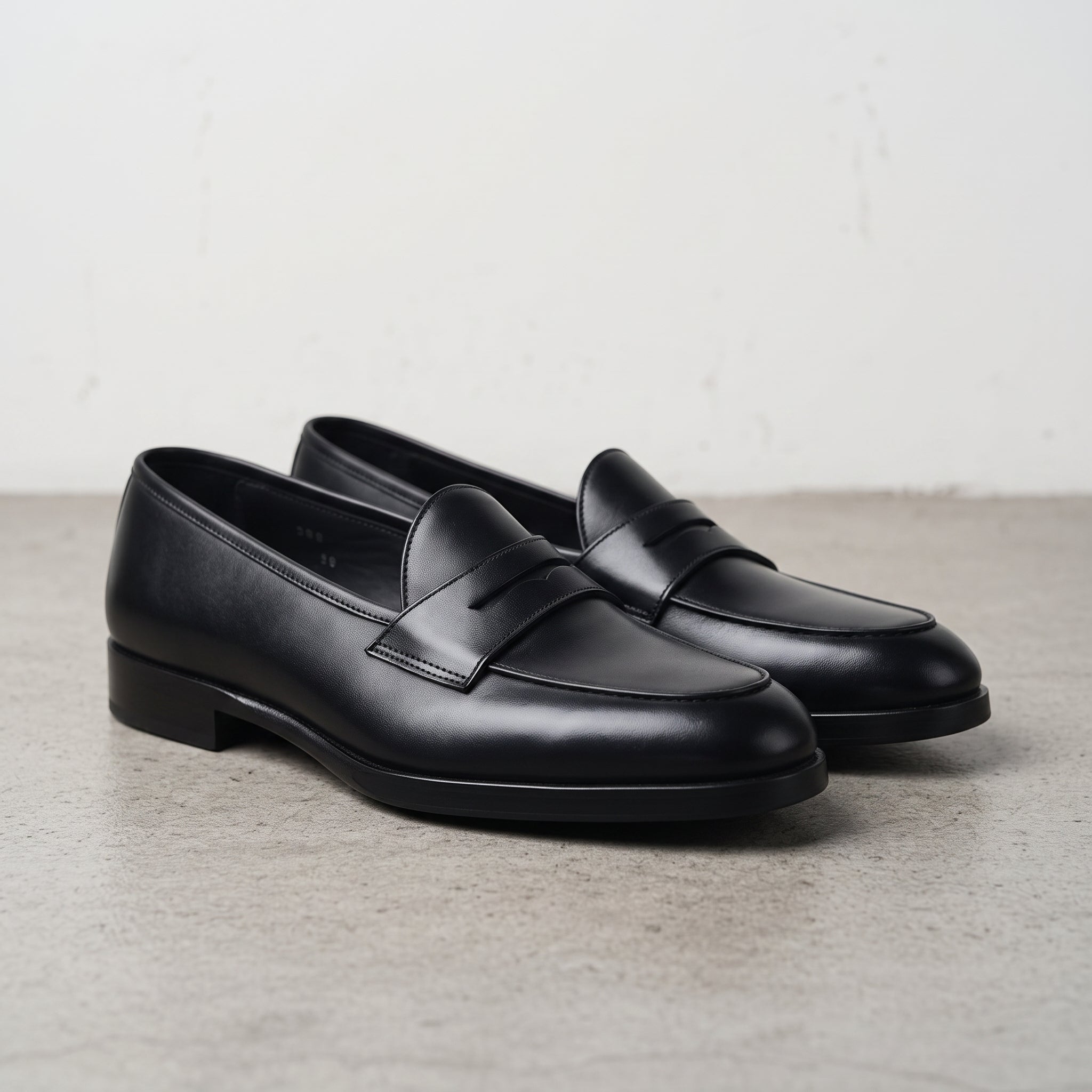 Men's Black Apron-Toe Leather Penny Loafers — Kinsley