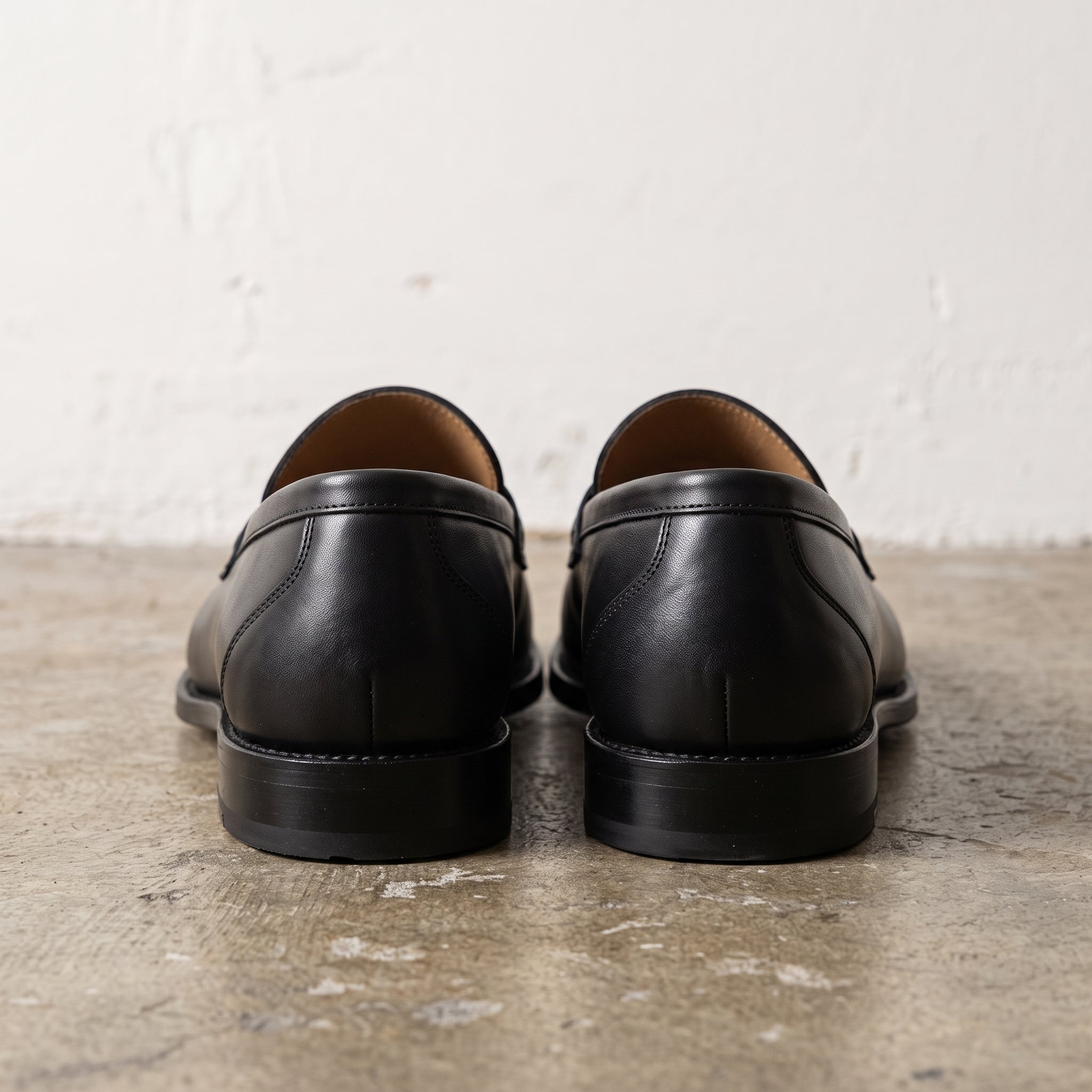 Men's Black Apron-Toe Leather Penny Loafers — Swinton