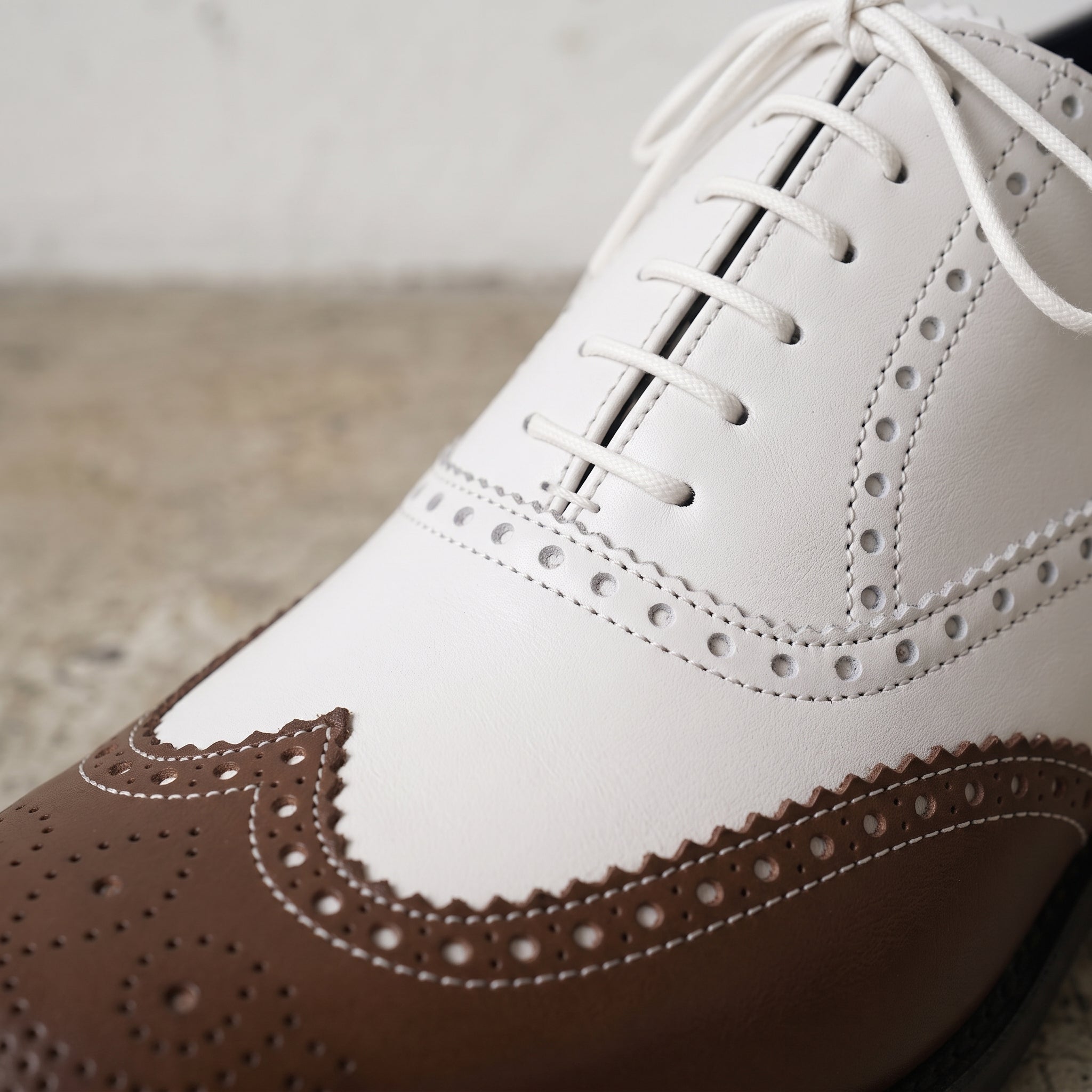 Men's Brown and White Two-Tone Wingtip Leather Oxfords — Gunnell