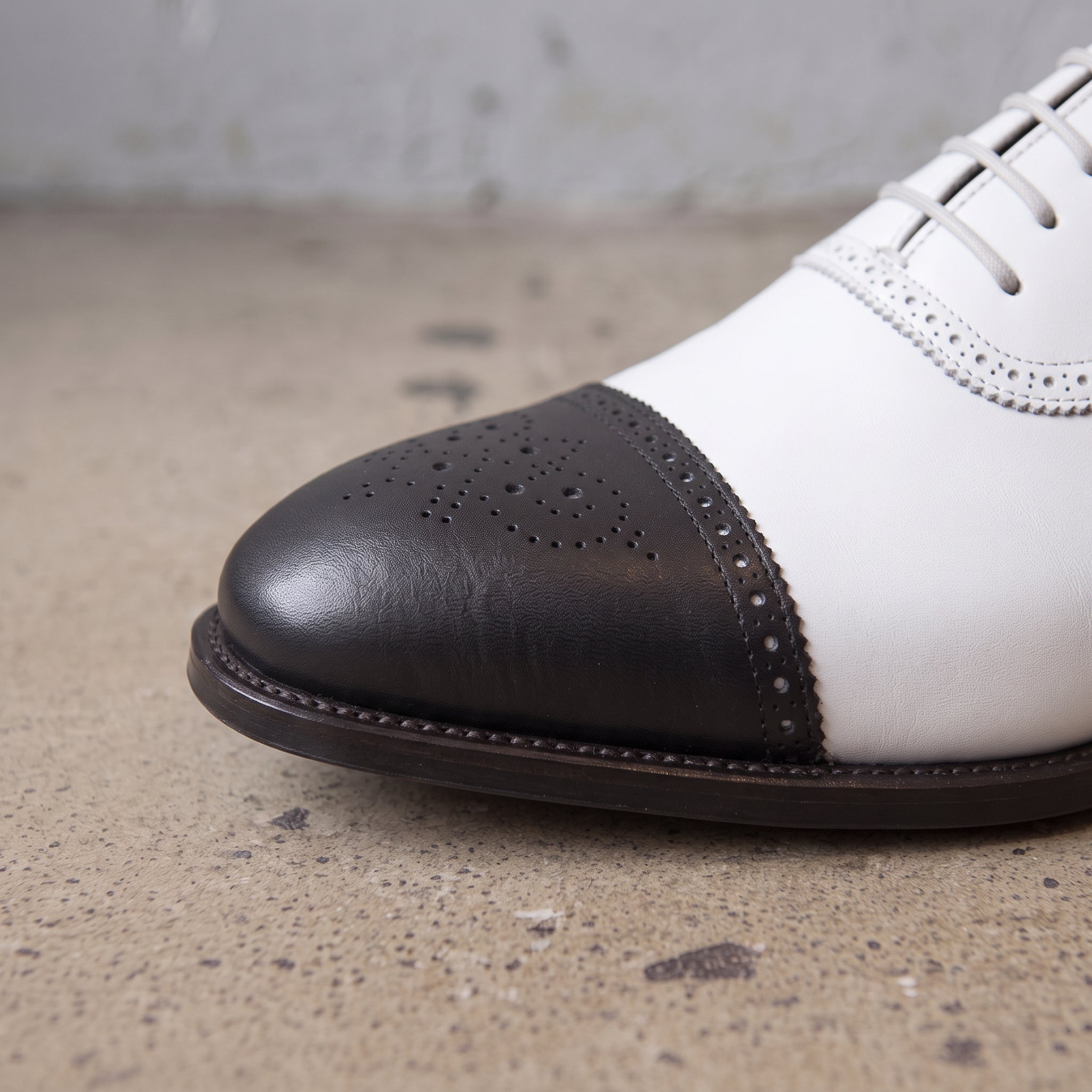 Men's White and Black Cap-Toe Spectator Leather Oxfords — Craven