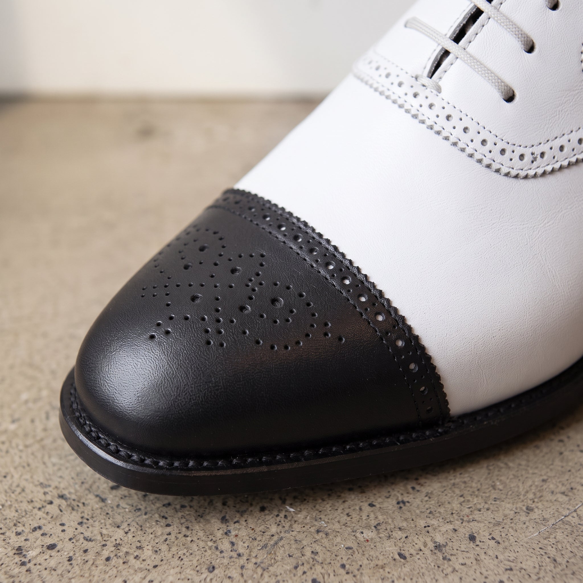 Men's White and Black Cap-Toe Spectator Leather Oxfords — Craven