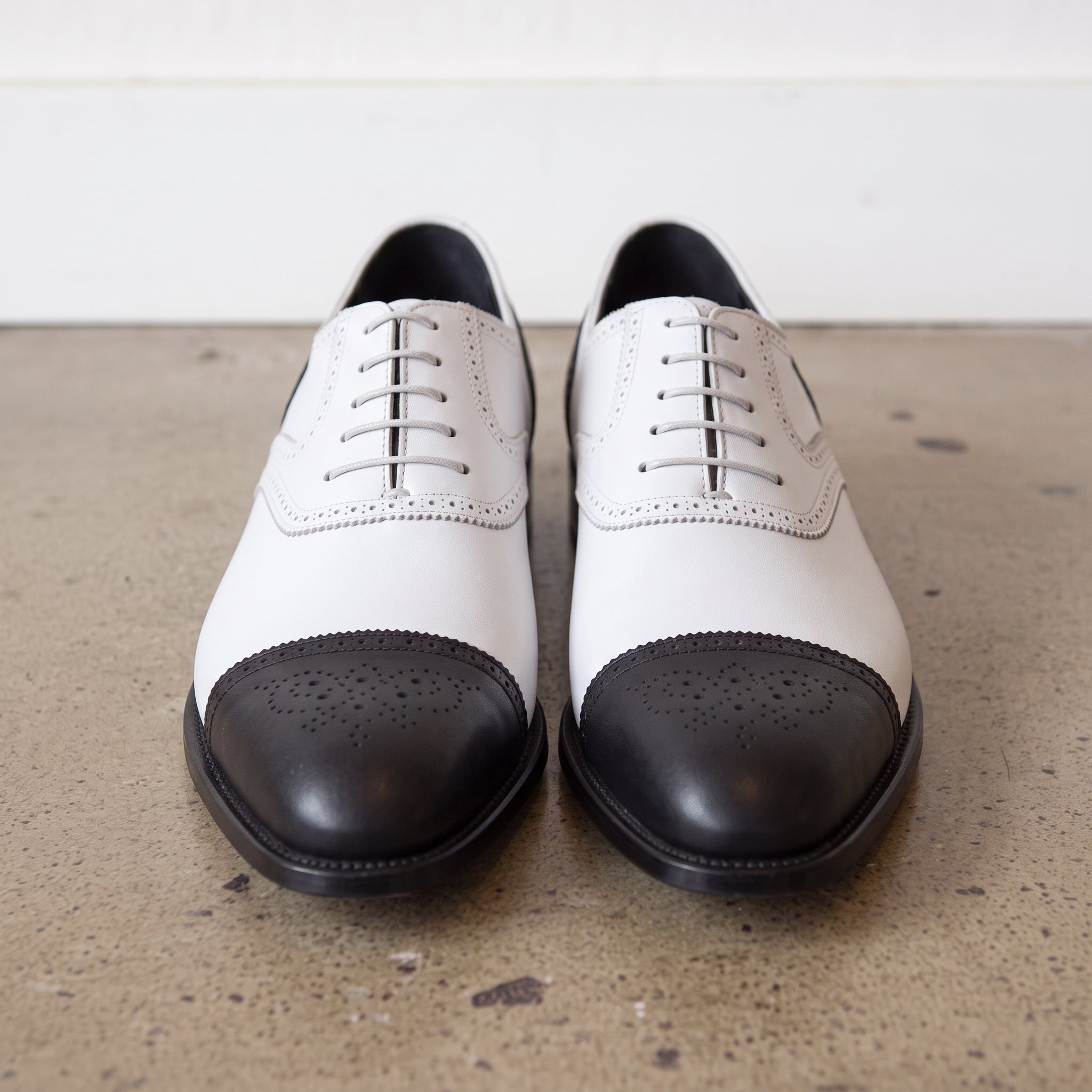 Men's White and Black Cap-Toe Spectator Leather Oxfords — Craven