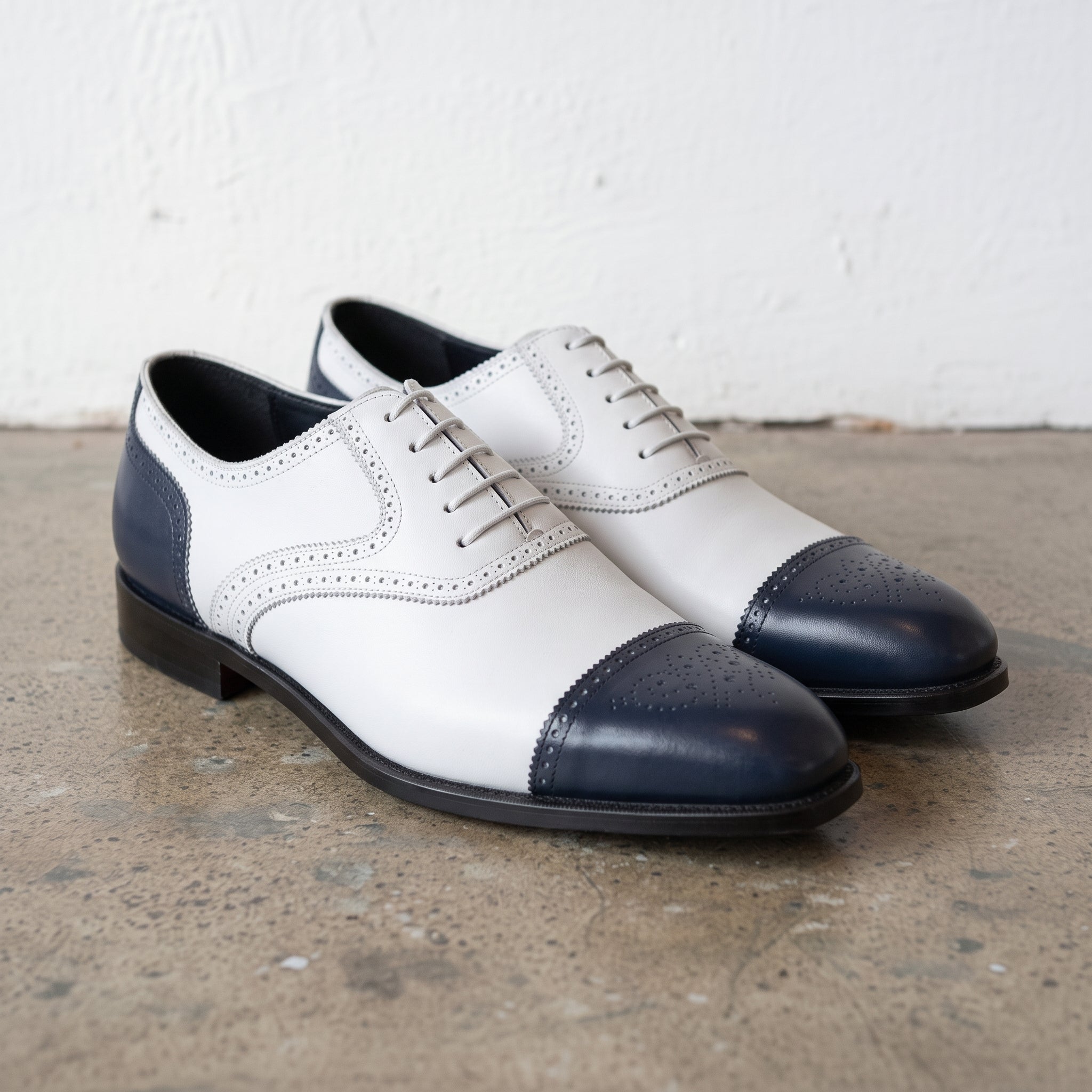 Men's White and Navy Cap-Toe Spectator Leather Oxfords — Craven