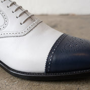Men's White and Navy Cap-Toe Spectator Leather Oxfords — Craven