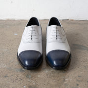 Men's White and Navy Cap-Toe Spectator Leather Oxfords — Craven