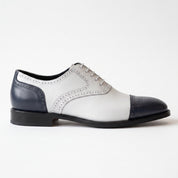 Men's White and Navy Cap-Toe Spectator Leather Oxfords — Craven