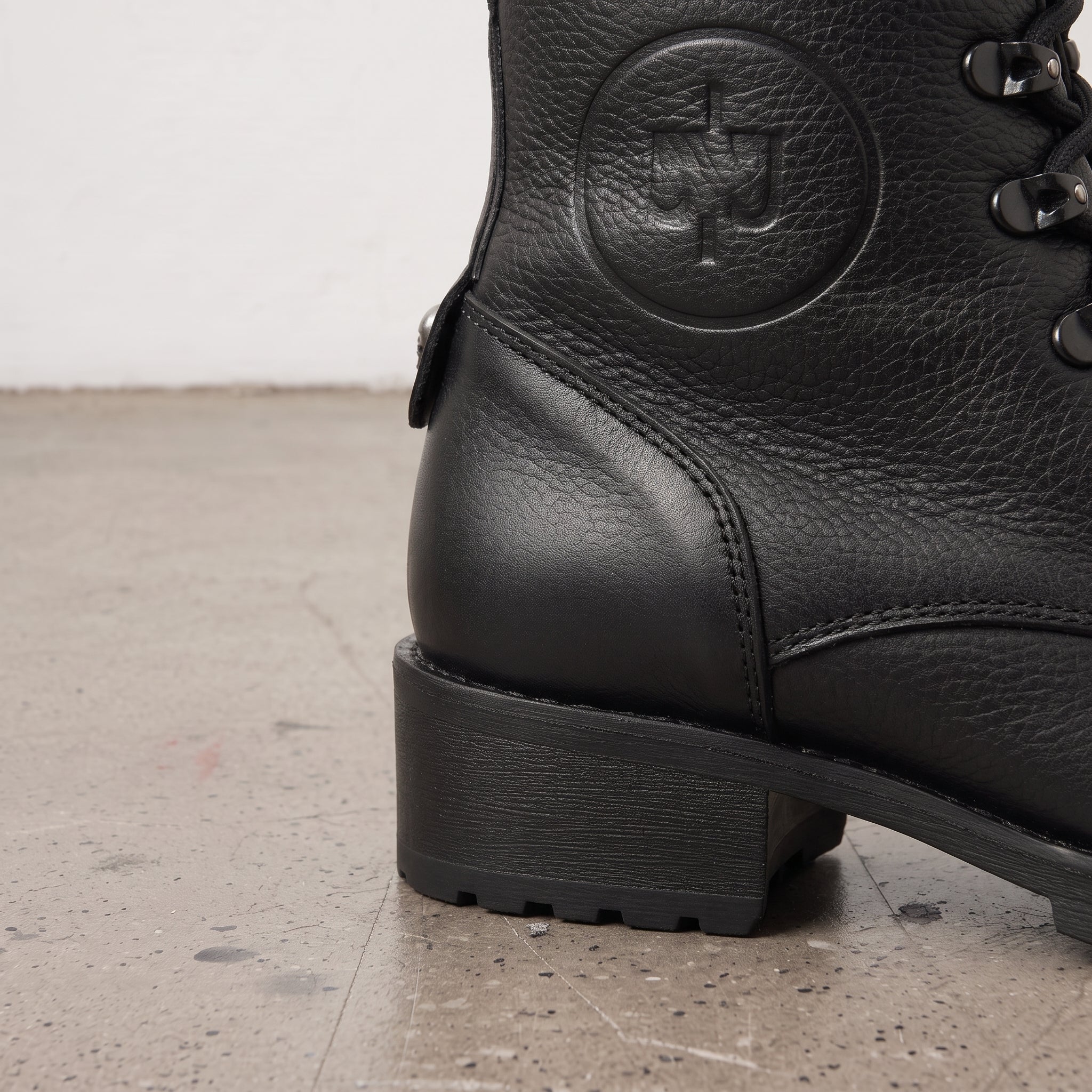 Women's Black Cap-Toe with Shift Pad Pebbled Leather Biker Boots — Bridport