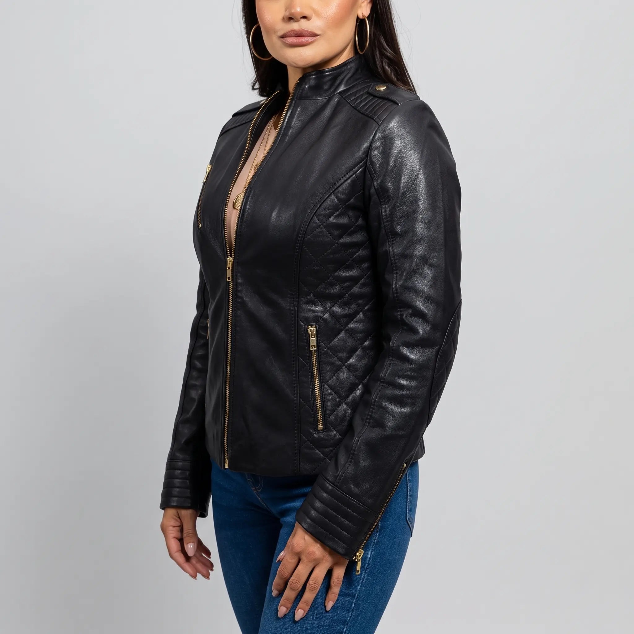 womens-black-quilted-leather-biker-jacket-kearsley-kearsley-jacket-side-studio.webp